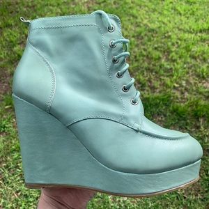 Seafoam green leather wedge boots